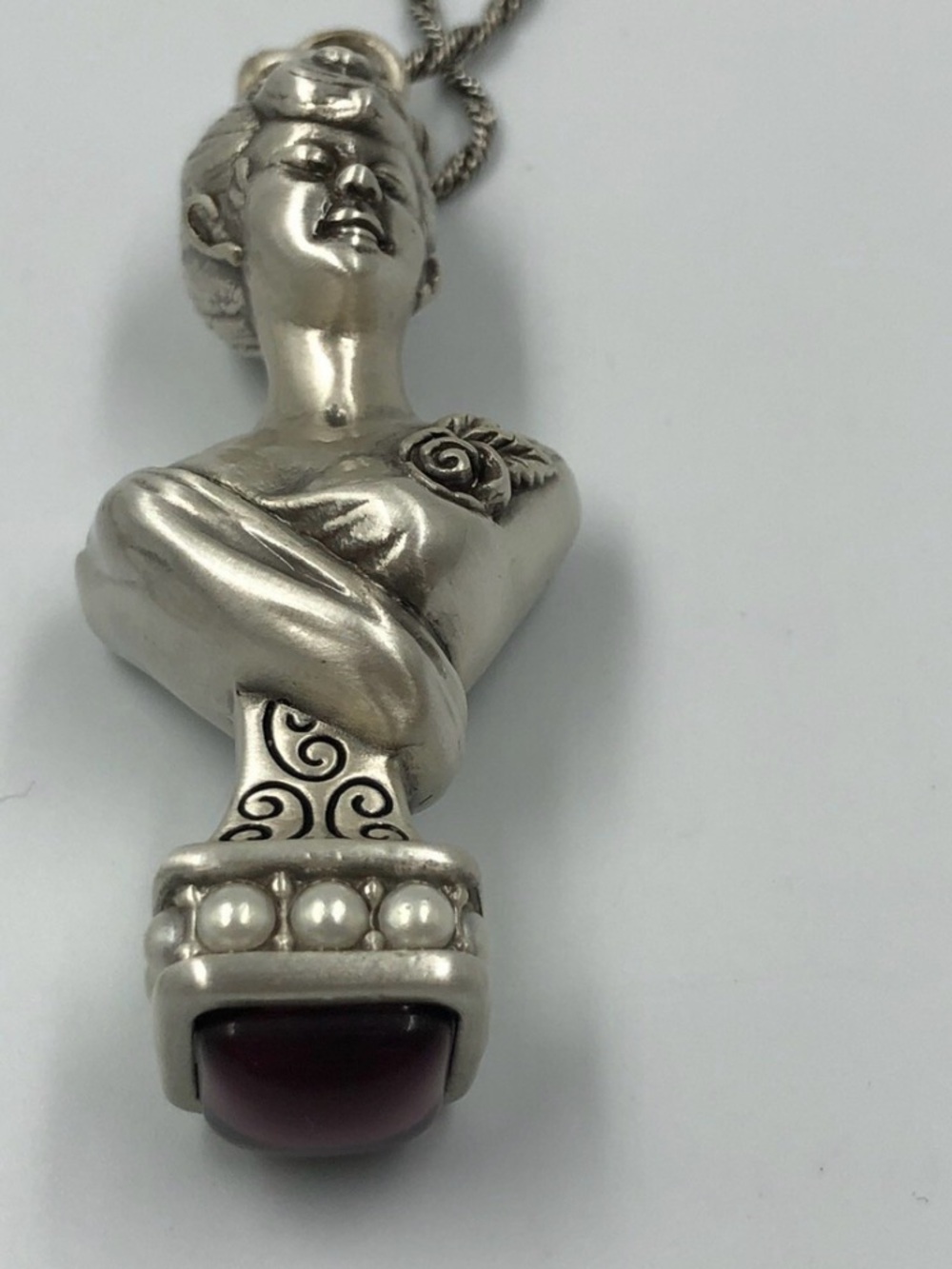 Brighton Woman Bust Pendant Necklace with Dark Purple Stone.